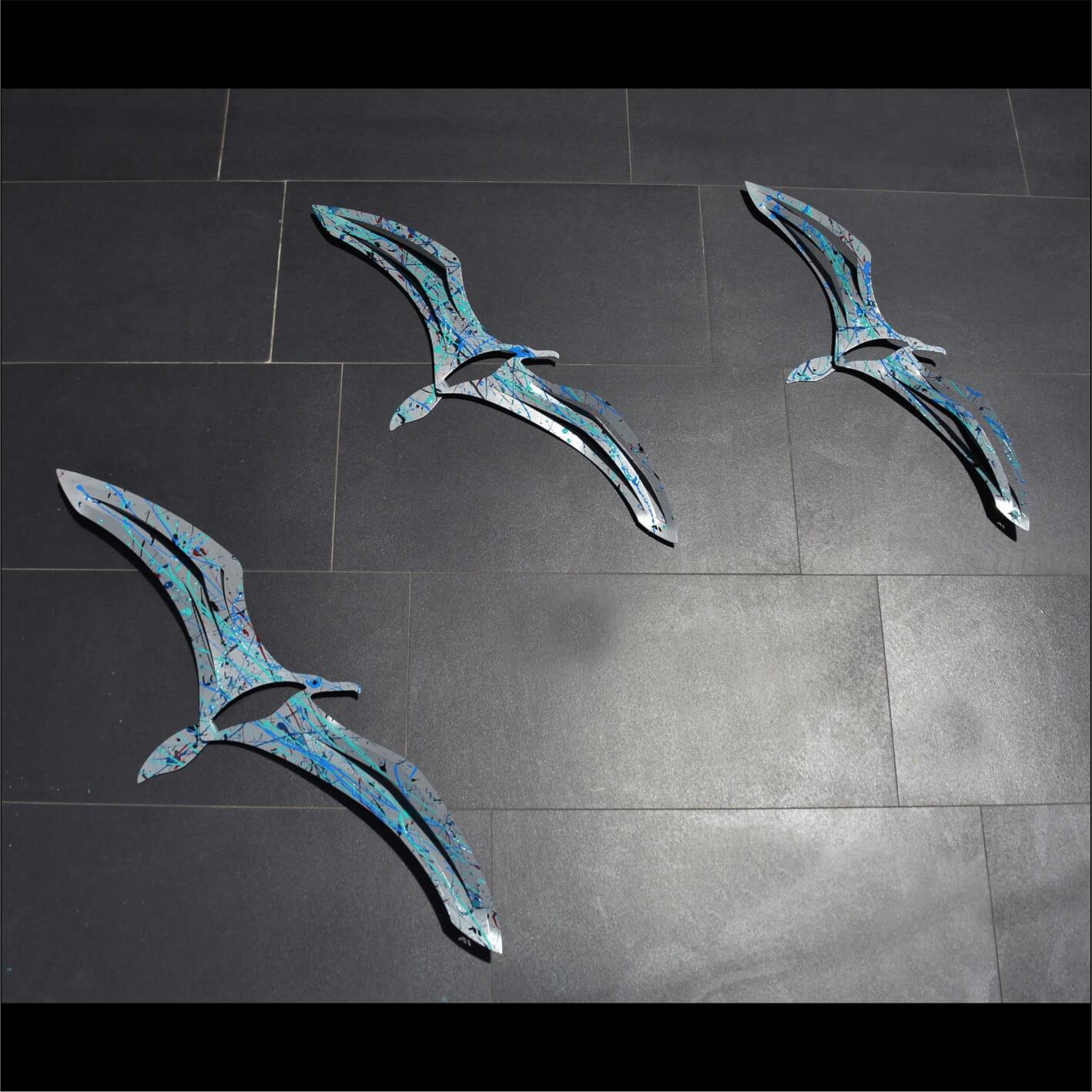 Gaviotas de Pared Acero con Salpicaduras Azules