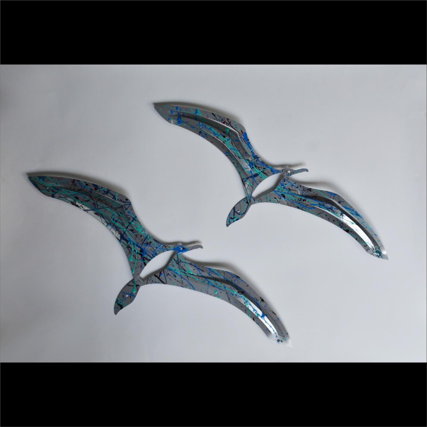 Gaviotas de Pared Acero con Salpicaduras Azules