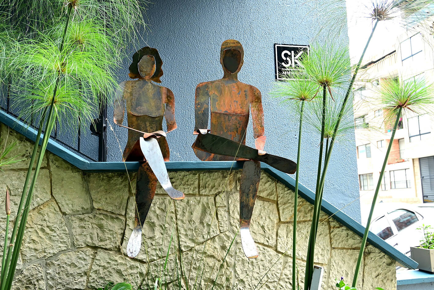 Escultura Pareja en Acero Crudo